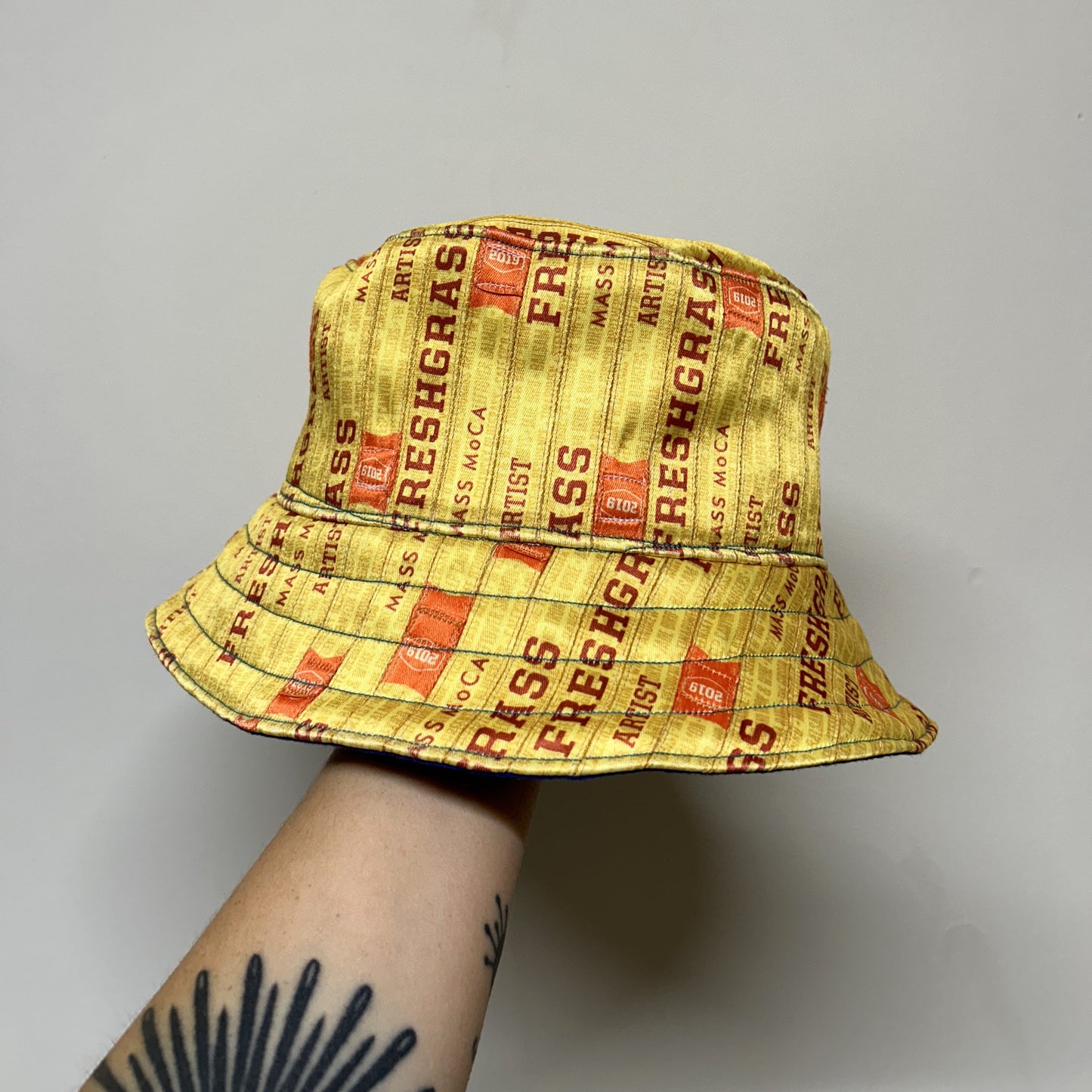 FreshGrass Wristband Bucket Hat: Yellow w/Blue Lining
