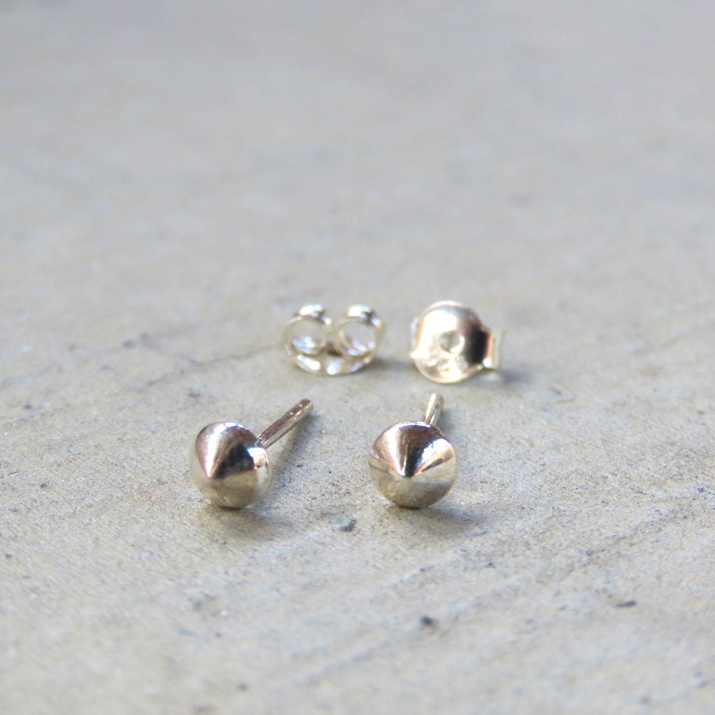 Abstract Studs: Silver Cones
