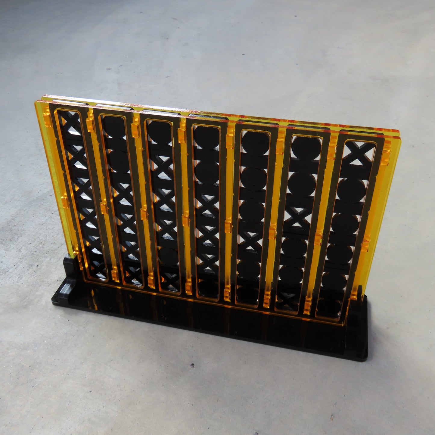 Acrylic Four In A Row Game: Roman Lattice in Black and Gold
